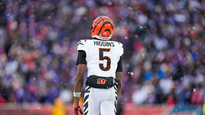 Cincinnati Bengals wide receiver Tee Higgins (5) walks for the sideline after hitting his head for a second time in the fourth quarter of the NFL Week 14 game between the Buffalo Bills and the Cincinnati Bengals at Highmark Stadium in Orchard Park, N.Y., on Sunday, Dec. 7, 2025. The Bills overcame a halftime deficit to win 39-34.
