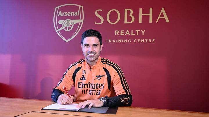 Manager Mikel Arteta signs a contract extension at Arsenal FC