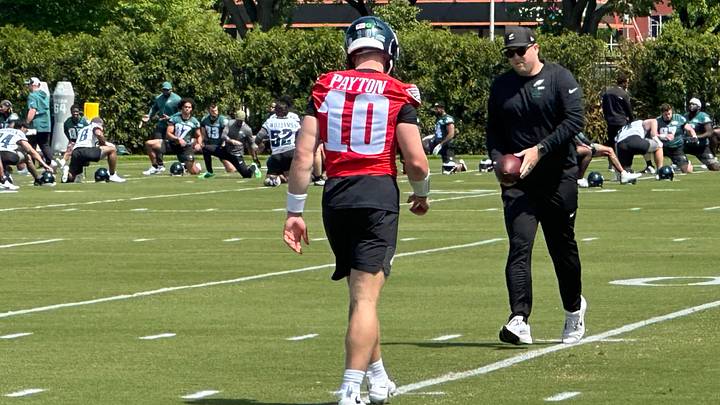 Eagles QB coach Parks Frazier works with Cole Payton.