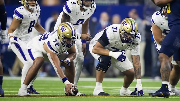 Jan 8, 2024; Houston, TX, USA; Washington Huskies quarterback Michael Penix Jr. (9) calls a play alongside offensive lineman Parker Brailsford (72), offensive lineman Nate Kalepo (71) and running back Will Nixon (8) against the Michigan Wolverines during the 2024 College Football Playoff national championship game at NRG Stadium. Mandatory Credit: Mark J. Rebilas-USA TODAY Sports