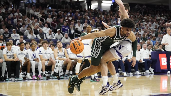 Jan 7, 2024; Evanston, Illinois, USA; Northwestern Wildcats guard Brooks Barnhizer (13) defends
