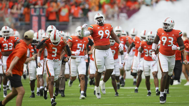 Miami Hurricanes defensive lineman Ahmad Moten (99) reacts as he takes the field prior to the game against the Texas A&M Aggies at Hard Rock Stadium. 