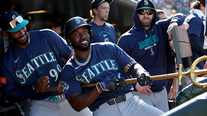 Sep 13, 2026; West Sacramento, California, USA; Seattle Mariners left fielder Randy Arozarena (56) celebrates with Lazaro Montes (99) in the dugout after hitting a solo home run against Athletics pitcher Hogan Harris (not pictured) during the eighth inning at Sutter Health Park. Mandatory Credit: Dennis Lee-Imagn Images Sep 13, 2026; West Sacramento, California, USA; Seattle Mariners left fielder Randy Arozarena (56) celebrates with Lazaro Montes (99) in the dugout after hitting a solo home run against Athletics pitcher Hogan Harris (not pictured) during the eighth inning at Sutter Health Park. Mandatory Credit: Dennis Lee-Imagn Images