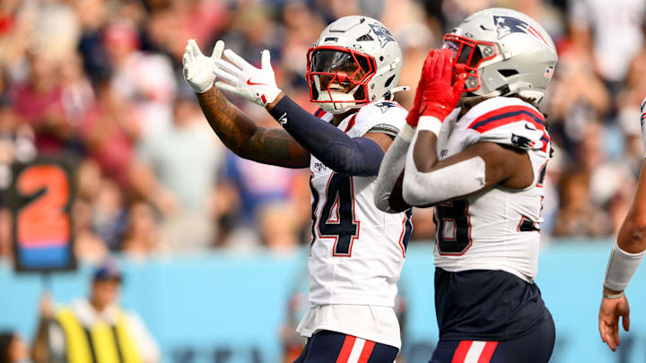 New England Patriots wide receiver Kendrick Bourne (84) celebrates the touchdown of running back Rhamondre Stevenson (38) against the Tennessee Titans.