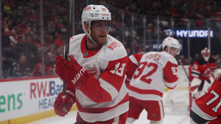 Mar 8, 2026; Newark, New Jersey, USA;  Detroit Red Wings center Andrew Copp (18) looks up ice during a play against the New Jersey Devils during the first period at Prudential Center. Mandatory Credit: Thomas Salus-Imagn Images
