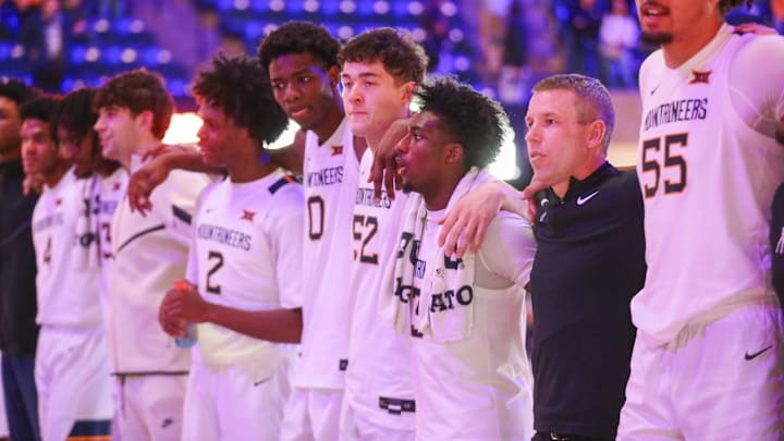 Dec 9, 2025; Morgantown, West Virginia, USA; West Virginia Mountaineers players celebrate after defeating the Little Rock Trojans at Hope Coliseum. Mandatory Credit: Ben Queen-Imagn Images Dec 9, 2025; Morgantown, West Virginia, USA; West Virginia Mountaineers players celebrate after defeating the Little Rock Trojans at Hope Coliseum. Mandatory Credit: Ben Queen-Imagn Images
