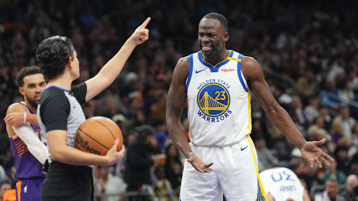 Nov 30, 2024; Phoenix, Arizona, USA; Golden State Warriors forward Draymond Green (23) argues a call during the second half against the Phoenix Suns at Footprint Center. Mandatory Credit: Joe Camporeale-Imagn Images