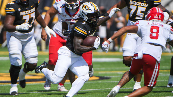 Sept 13, 2025; Columbia, Missouri, USA; Missouri Tigers running back Marquise Davis rushes the football in the third quarter at Faurot Field.