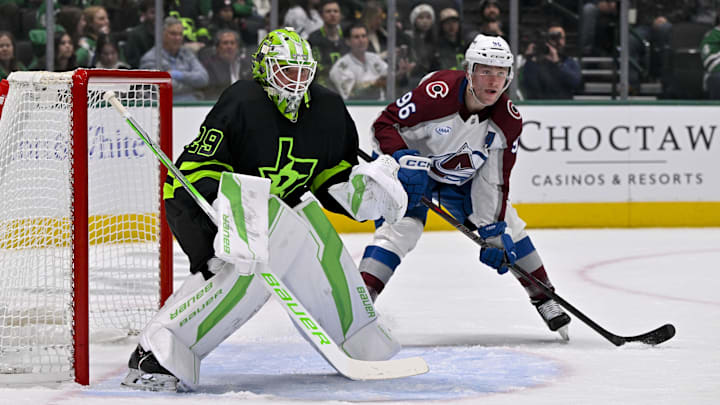 Nov 29, 2024; Dallas, Texas, USA; Dallas Stars goaltender Jake Oettinger (29) and Colorado Avalanche right wing Mikko Rantanen (96) in action during the game between the Dallas Stars and the Colorado Avalanche at American Airlines Center. Mandatory Credit: Jerome Miron-Imagn Images