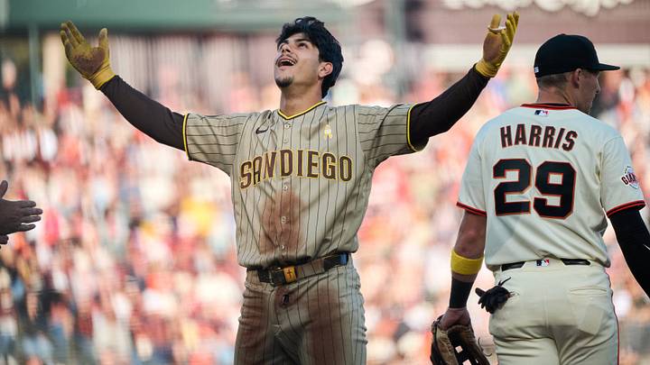 Sep 13, 2026; San Francisco, California, USA; San Diego Padres catcher Ethan Salas (8) reacts at third base after hitting a triple against San Francisco Giants starting pitcher Logan Webb (not pictured) during the fourth inning at Oracle Park. Mandatory Credit: Robert Edwards-Imagn Images Sep 13, 2026; San Francisco, California, USA; San Diego Padres catcher Ethan Salas (8) reacts at third base after hitting a triple against San Francisco Giants starting pitcher Logan Webb (not pictured) during the fourth inning at Oracle Park. Mandatory Credit: Robert Edwards-Imagn Images