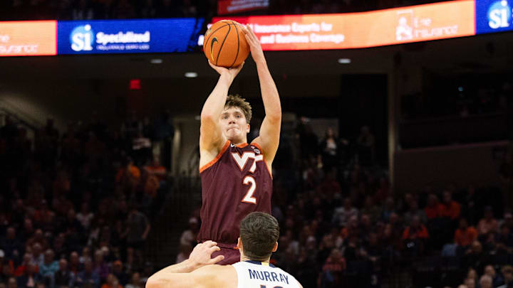 Feb 1, 2025; Charlottesville, Virginia, USA; Virginia Tech Hokies guard Jaden Schutt (2) shoots the ball over Virginia Cavaliers guard Taine Murray (10) in the second half at John Paul Jones Arena. Mandatory Credit: Emily Morgan-Imagn Images Feb 1, 2025; Charlottesville, Virginia, USA; Virginia Tech Hokies guard Jaden Schutt (2) shoots the ball over Virginia Cavaliers guard Taine Murray (10) in the second half at John Paul Jones Arena. Mandatory Credit: Emily Morgan-Imagn Images