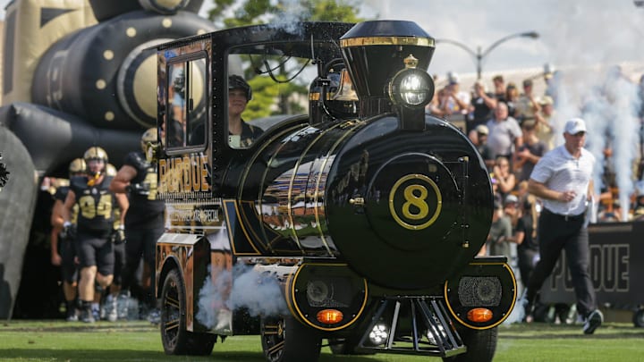 The Boilermaker Special leads the Purdue Boilermakers onto the field before the NCAA football game