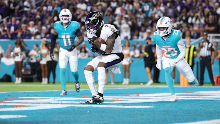 Baltimore Ravens wide receiver Rashod Bateman (7) catches a pass for a touchdown during the third quarter against the Miami Dolphins at Hard Rock Stadium.