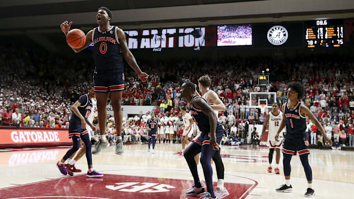 Jan 24, 2024; Tuscaloosa, Alabama, USA;  Auburn Tigers guard K.D. Johnson (0) reacts after Alabama