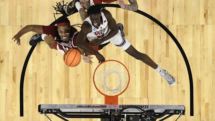 Mar 27, 2025; San Francisco, CA, USA; Texas Tech Red Raiders forward Federiko Federiko (33), Arkansas Razorbacks forward Jonas Aidoo (9) and forward Trevon Brazile (4) battle for control of a rebound during the second half during a West Regional semifinal of the 2025 NCAA tournament at Chase Center. Mandatory Credit: Eakin Howard-Imagn Images