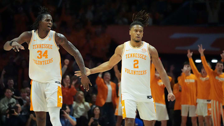 Tennessee's Felix Okpara (34) and Chaz Lanier (2) celebrate after Lanier hit a 3-point basket in the NCAA college basketball game against Kentucky on Tuesday, Jan. 28, 2025, in Knoxville, Tenn.