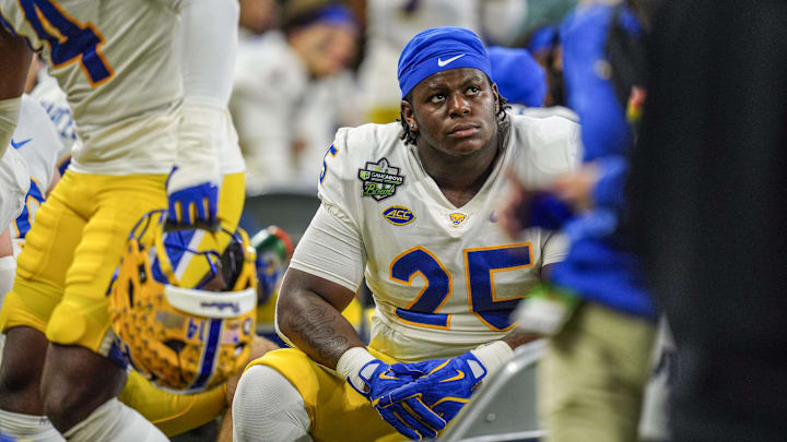 Pittsburgh Panthers defensive lineman Jahsear Whittington (25) looks on from the sideline during the first half of the 2024 GameAbove Sports Bowl at Ford Field in Detroit, Thursday, Dec. 26, 2024. Pittsburgh is down 20-12 at the half. Pittsburgh Panthers defensive lineman Jahsear Whittington (25) looks on from the sideline during the first half of the 2024 GameAbove Sports Bowl at Ford Field in Detroit, Thursday, Dec. 26, 2024. Pittsburgh is down 20-12 at the half.