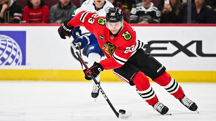 Feb 13, 2024; Chicago, Illinois, USA; Chicago Blackhawks forward Philipp Kurashev (23) controls the