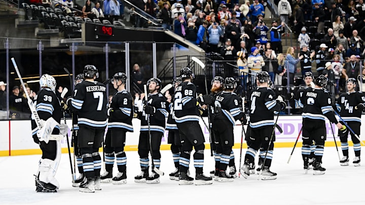 The Utah Hockey Club celebrates after a win over the St. Louis Blues earlier this season.