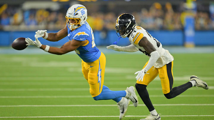 Nov 9, 2025; Inglewood, California, USA; Los Angeles Chargers tight end Oronde Gadsden II (86) is unable to catch the ball defended by Pittsburgh Steelers cornerback Joey Porter Jr. (24) during the first quarter of the game at SoFi Stadium. Mandatory Credit: Jayne Kamin-Oncea-Imagn Images