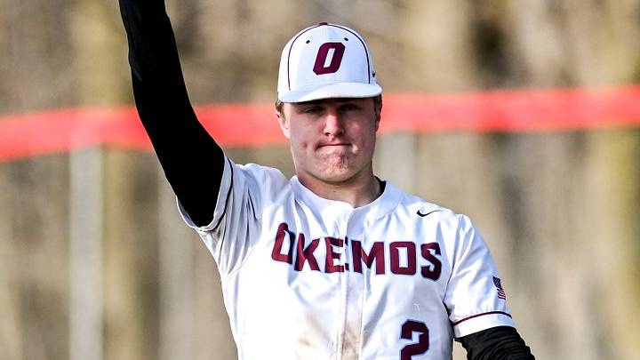 Okemos' Caleb Bonemer throws the ball back to the pitcher during the seventh inning in the game against Mason on Friday, April 5, 2024, at Mason High School. Okemos' Caleb Bonemer throws the ball back to the pitcher during the seventh inning in the game against Mason on Friday, April 5, 2024, at Mason High School.