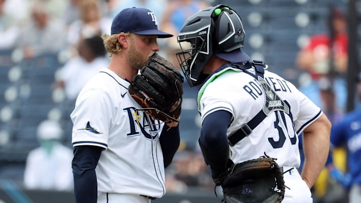 Tampa Bay Rays pitcher Shane Baz (left) talks with catcher Ben Rortvedt (30) during a start two weeks ago in Tampa.