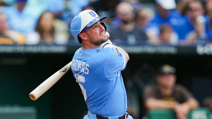 Jul 18, 2026; Kansas City, Missouri, USA; Kansas City Royals center fielder Lane Thomas (15) bats during the sixth inning against the San Diego Padres at Kauffman Stadium. Mandatory Credit: Jay Biggerstaff-Imagn Images