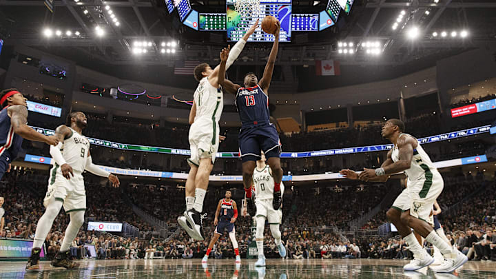 Jan 28, 2020; Milwaukee, Wisconsin, USA; Washington Wizards center Thomas Bryant (13) shoots against Milwaukee Bucks center Brook Lopez (11) during the second quarter at Fiserv Forum. Mandatory Credit: Jeff Hanisch-Imagn Images Jan 28, 2020; Milwaukee, Wisconsin, USA; Washington Wizards center Thomas Bryant (13) shoots against Milwaukee Bucks center Brook Lopez (11) during the second quarter at Fiserv Forum. Mandatory Credit: Jeff Hanisch-Imagn Images