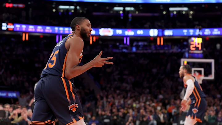 Nov 15, 2024; New York, New York, USA; New York Knicks forward Mikal Bridges (25) celebrates his three point shot against the Brooklyn Nets during the third quarter at Madison Square Garden. Mandatory Credit: Brad Penner-Imagn Images