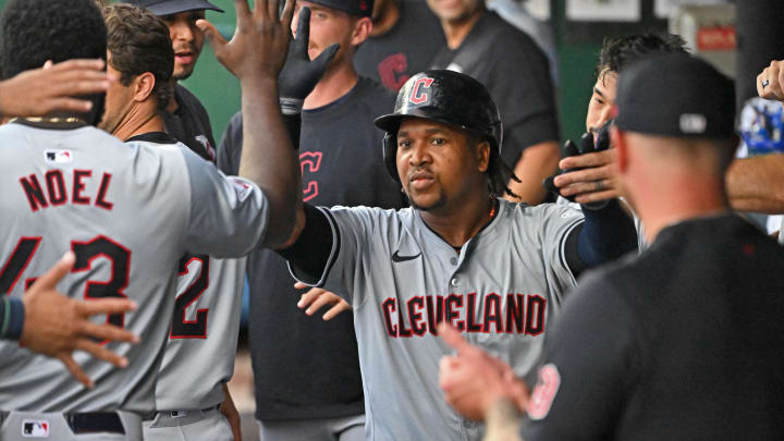 Jun 28, 2024; Kansas City, Missouri, USA;  Cleveland Guardians third baseman Jose Ramirez (11) celebrates in the dugout after hitting a solo home run in the first inning against the Kansas City Royals at Kauffman Stadium. Mandatory Credit: Peter Aiken-USA TODAY Sports
