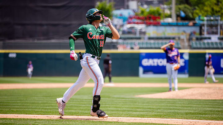 May 23, 2024; Charlotte, NC, USA; Miami (Fl) Hurricanes outfielder Jake Kulikowski (19) celebrates a home run during the ninth inning against the Clemson Tigers during the ACC Baseball Tournament at Truist Field. Mandatory Credit: Scott Kinser-Imagn Images