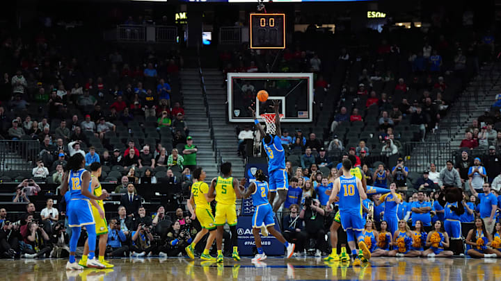 Mar 14, 2024; Las Vegas, NV, USA; UCLA Bruins forward Adem Bona (3) attempts to rebound the ball as time expires against the Oregon Ducks at T-Mobile Arena. Mandatory Credit: Kirby Lee-USA TODAY Sports