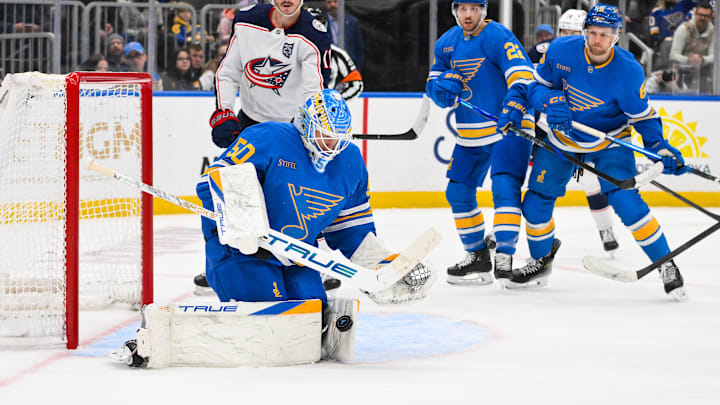 Jan 31, 2026; St. Louis, Missouri, USA; St. Louis Blues goaltender Jordan Binnington (50) defends the net against the Columbus Blue Jackets during the first period at Enterprise Center. Mandatory Credit: Jeff Curry-Imagn Images