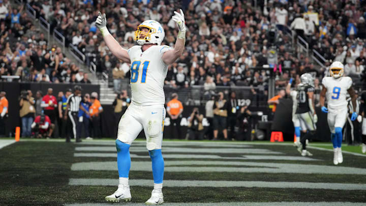 Los Angeles Chargers tight end Will Dissly celebrates after scoring in a 2-yard touchdown reception against the Las Vegas Raiders in the fourth quarter at Allegiant Stadium. 
