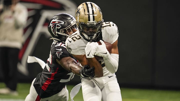 New Orleans Saints wide receiver Chris Olave (12) catches a two point conversion against the Atlanta Falcons New Orleans Saints wide receiver Chris Olave (12) catches a two point conversion against the Atlanta Falcons