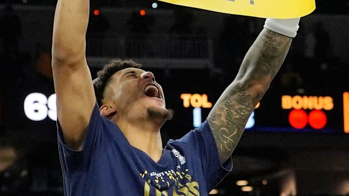 Michigan forward Yaxel Lendeborg (23) celebrates winning the NCAA national championship against Connecticut at Lucas Oil Stadium in Indianapolis on Monday, April 6, 2026.
