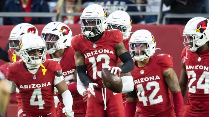 Jan 5, 2025; Glendale, Arizona, USA; Arizona Cardinals cornerback Kei'Trel Clark (13) celebrates an interception with teammates against the San Francisco 49ers in the second half at State Farm Stadium. Mandatory Credit: Mark J. Rebilas-Imagn Images