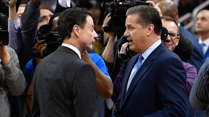 Dec 21, 2016; Louisville, KY, USA;  Louisville Cardinals head coach Rick Pitino shakes hands with Kentucky Wildcats head coach John Calipari before the first half at KFC Yum! Center. Louisville defeated Kentucky 73-70.  Mandatory Credit: Jamie Rhodes-Imagn Images