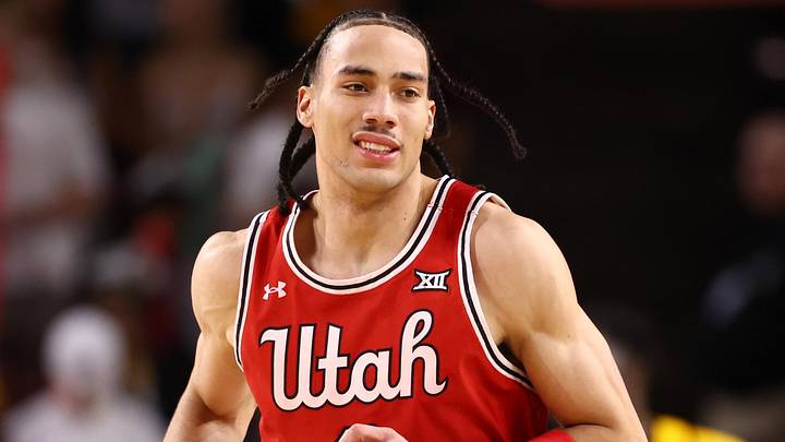 Kansas basketball forward  Keanu Dawes (8) while at Utah