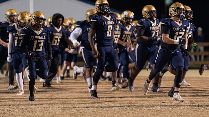 The Fairdale squad rushed onto the field before the Bulldogs and Butler Bears faced off in in the second round of the KHSAA Class 5A playoffs on Friday, Nov. 14, 2025.