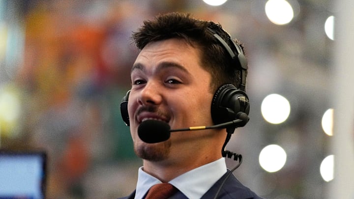 July 15, 2025; Atlanta, GA, USA; Auburn quarterback Jackson Arnold speaks to a radio interviewer during SEC Media Days at the College Football Hall of Fame in Atlanta.