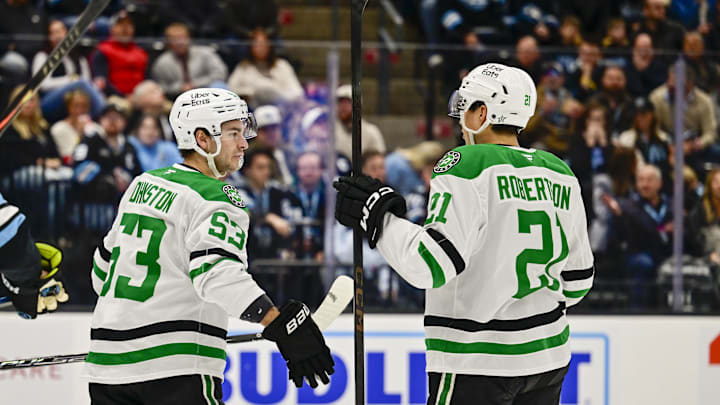Jan 31, 2026; Salt Lake City, Utah, USA; Dallas Stars center Wyatt Johnston (53) and left wing Jason Robertson (21) celebrate after a goal during first period against the Utah Mammoth at Delta Center. Mandatory Credit: Peter Creveling-Imagn Images