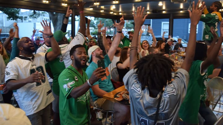 Philadelphia Eagles fans celebrate an Eagle's touchdown during a game against the Jacksonville Jaguars.