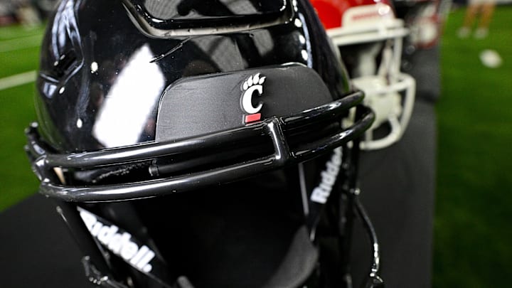 Jul 13, 2023; Arlington, TX, USA; A view of the Cincinnati Bearcats helmet and logo during the Big 12 football media day at AT&T Stadium. Mandatory Credit: Jerome Miron-Imagn Images