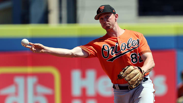 Mar 22, 2023; Dunedin, Florida, USA; Baltimore Orioles shortstop Jordan Westburg (82) throws the