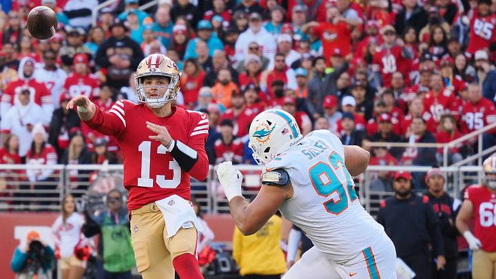 San Francisco 49ers quarterback Brock Purdy (13) throws the ball under pressure from Miami Dolphins defensive end Zach Sieler (92) during the first quarter at Levi's Stadium in December 2022. San Francisco 49ers quarterback Brock Purdy (13) throws the ball under pressure from Miami Dolphins defensive end Zach Sieler (92) during the first quarter at Levi's Stadium in December 2022.
