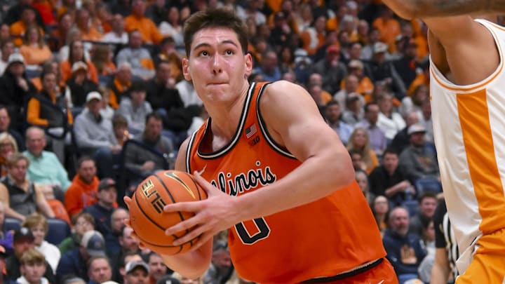 Dec 6, 2025; Nashville, Tennessee, USA; Illinois Fighting Illini forward David Mirkovic (0) drives to the basket against the Tennessee Volunteers during the second half at Bridgestone Arena. Mandatory Credit: Steve Roberts-Imagn Images Dec 6, 2025; Nashville, Tennessee, USA; Illinois Fighting Illini forward David Mirkovic (0) drives to the basket against the Tennessee Volunteers during the second half at Bridgestone Arena. Mandatory Credit: Steve Roberts-Imagn Images