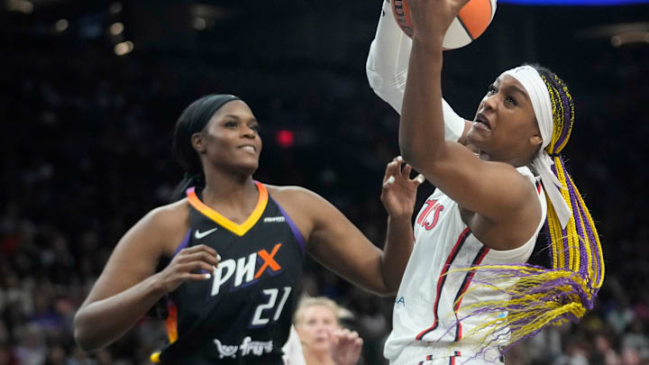 Washington Mystics forward Aaliyah Edwards (24) grabs a rebound against Phoenix Mercury center Kalani Brown (21) during the third quarter at PHX Arena on May 25, 2025.