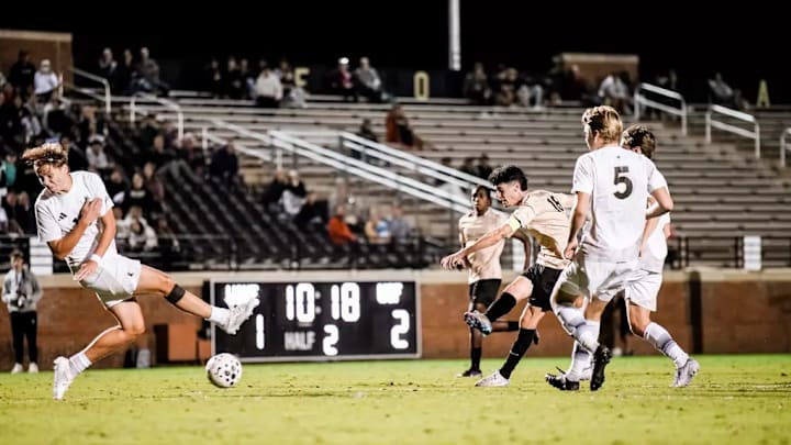Midfielder Cooper Flax (18) fires a low-driven shot to equalize for Wake Forest in the 80th minute against Wofford on Tuesday night at Spry Stadium in Winston-Salem, North Carolina.