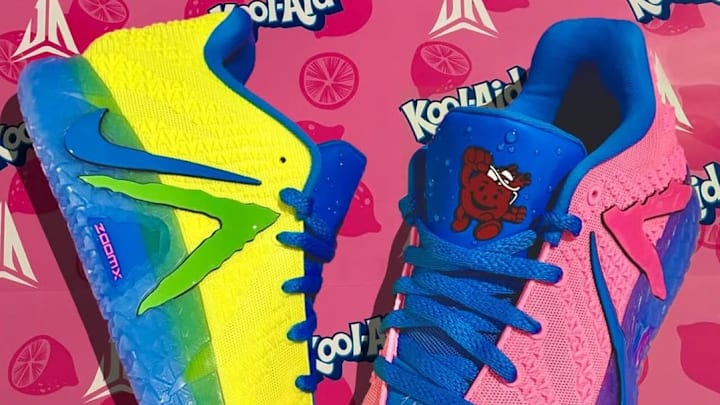 The Nike Ja 3 x Kool-Aid "Pink Beam and Lemon Venom" colorway. The Nike Ja 3 x Kool-Aid "Pink Beam and Lemon Venom" colorway.